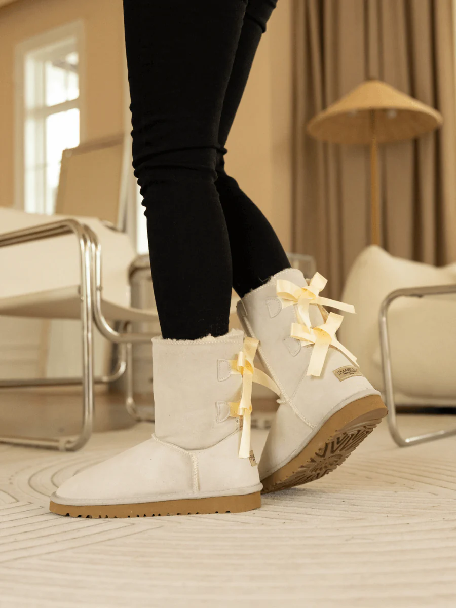 Smaibulun Ugg | Double Ballet Ribbon Bow Suede Shearling Boots - Ivory - Image 7