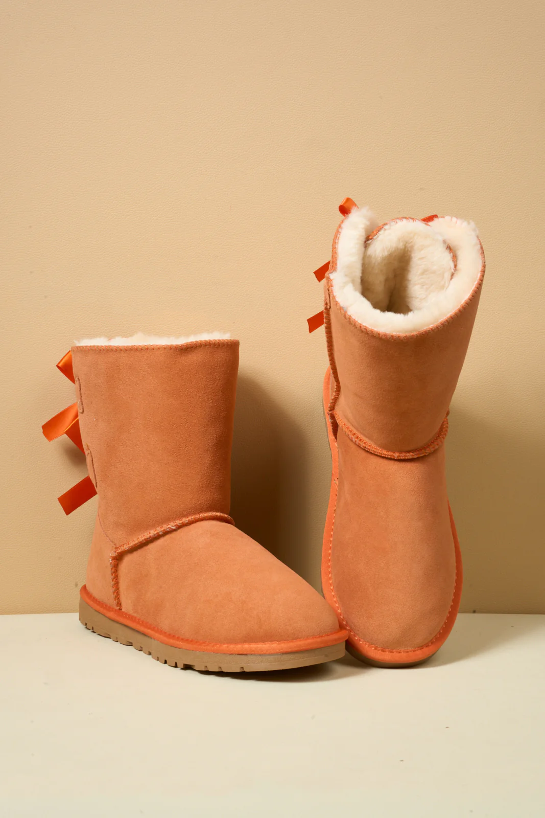 Smaibulun Ugg | Double Ballet Ribbon Bow Suede Shearling Boots - orange - Image 10