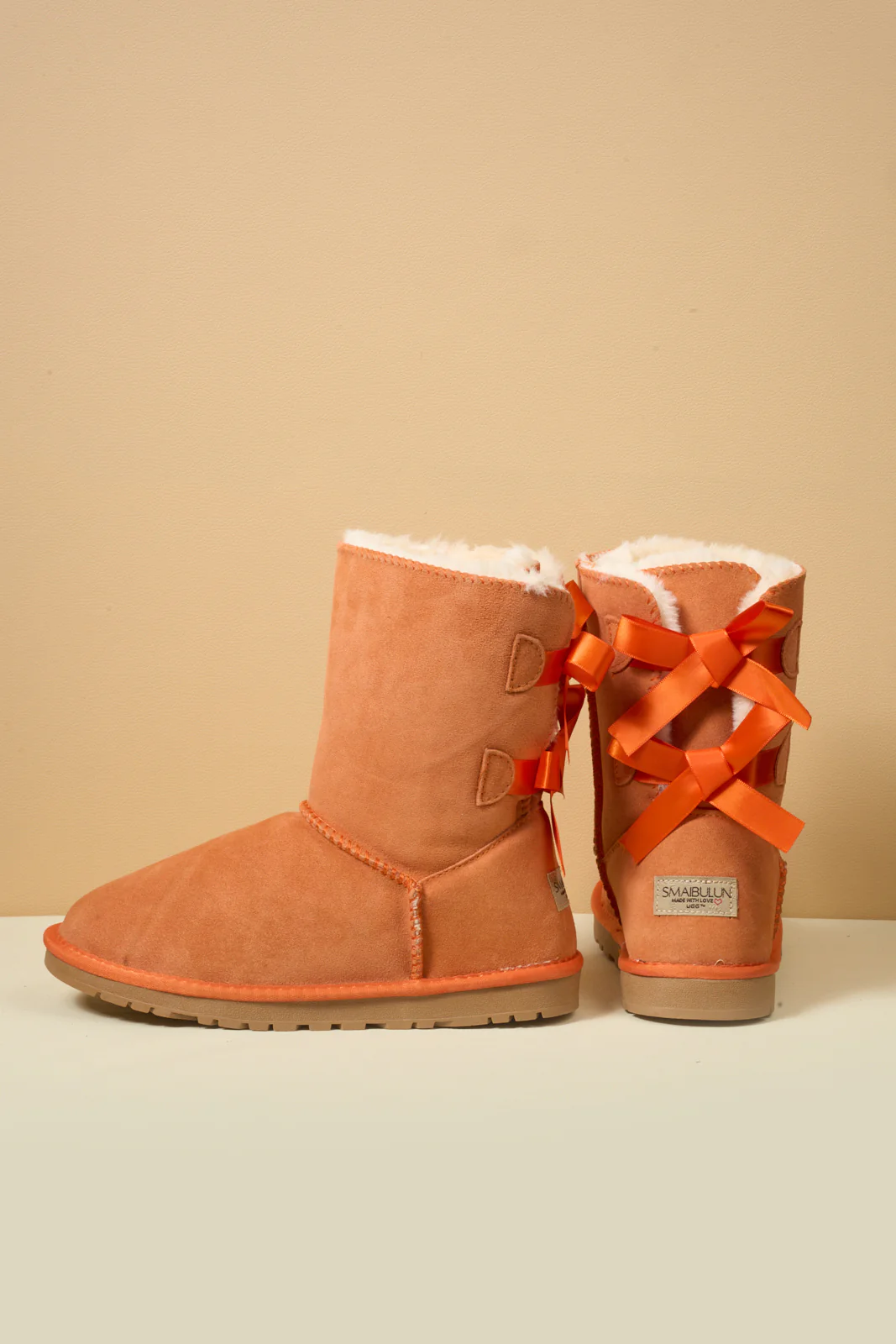 Smaibulun Ugg | Double Ballet Ribbon Bow Suede Shearling Boots - orange - Image 9