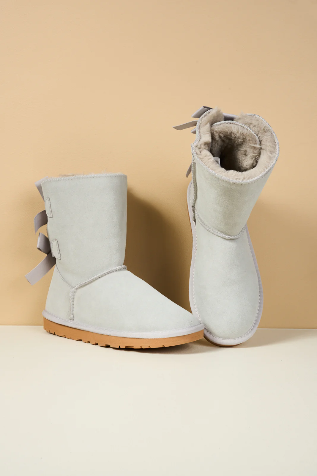 Smaibulun Ugg | Double Ballet Ribbon Bow Suede Shearling Boots - pale - Image 11