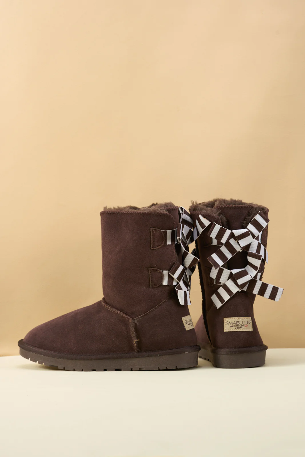 Smaibulun Ugg | Serenity Striped Bailey Bow Shearling Boots - Brown - Image 12