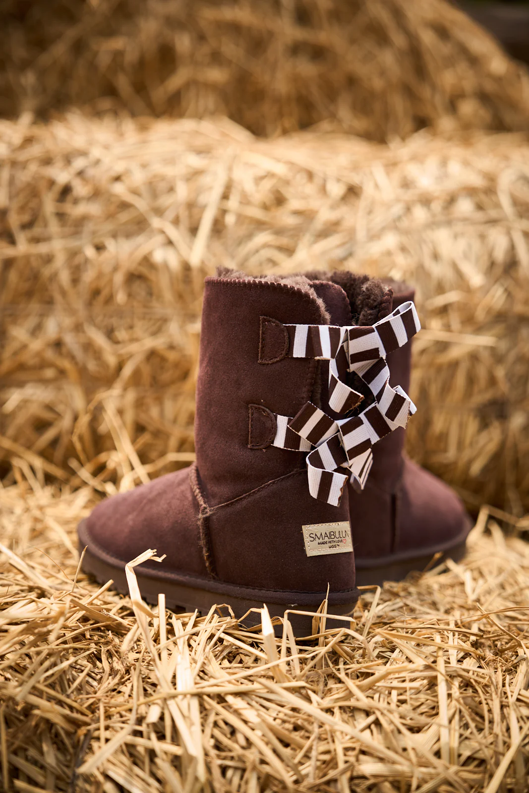 Smaibulun Ugg | Serenity Striped Bailey Bow Shearling Boots - Brown - Image 8